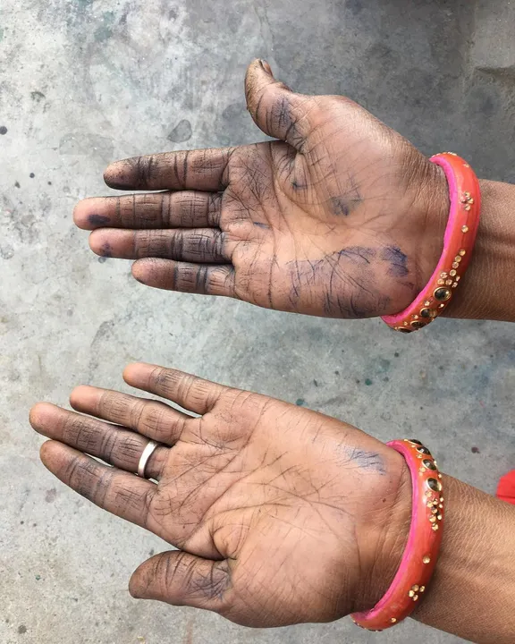 Indigo henna hand print by Sushila