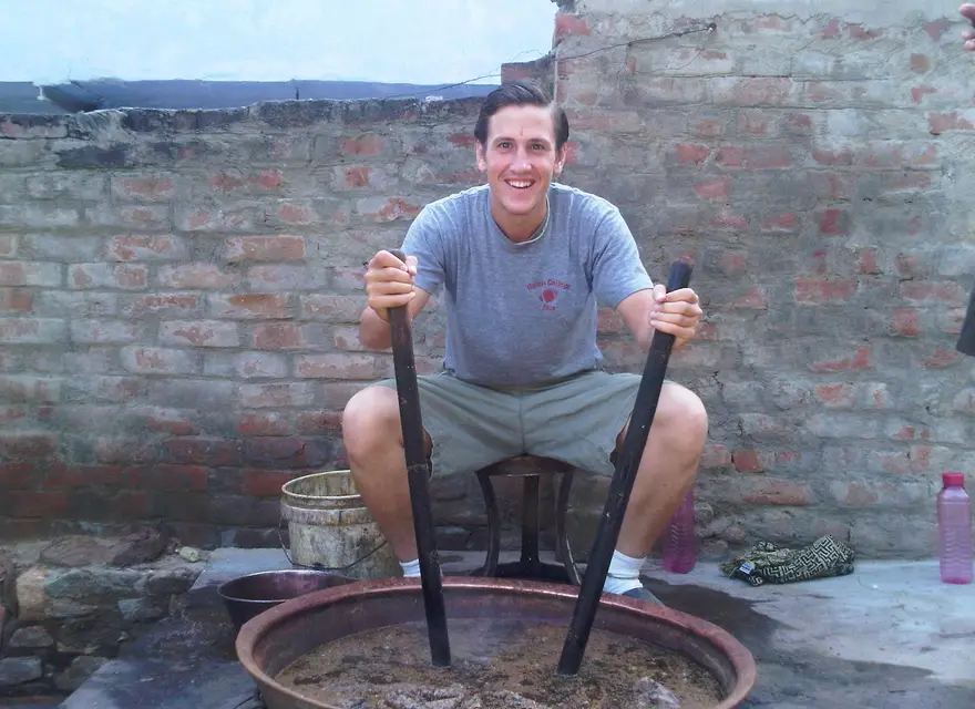 Stirring a dye vat in the first months, Bagru, 2010.